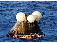 Apollo 13 - Pararescuemen Attach Flotation Collar to Spacecraft