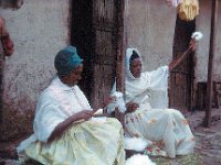 1966041131 Our neighbors spinning cotton - Addis