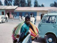 1964111326 Bus Station - Addis - boy selling Shash