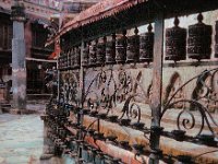 1966071421 Prayer wheels at Monastary near Khatmandu - Nepal